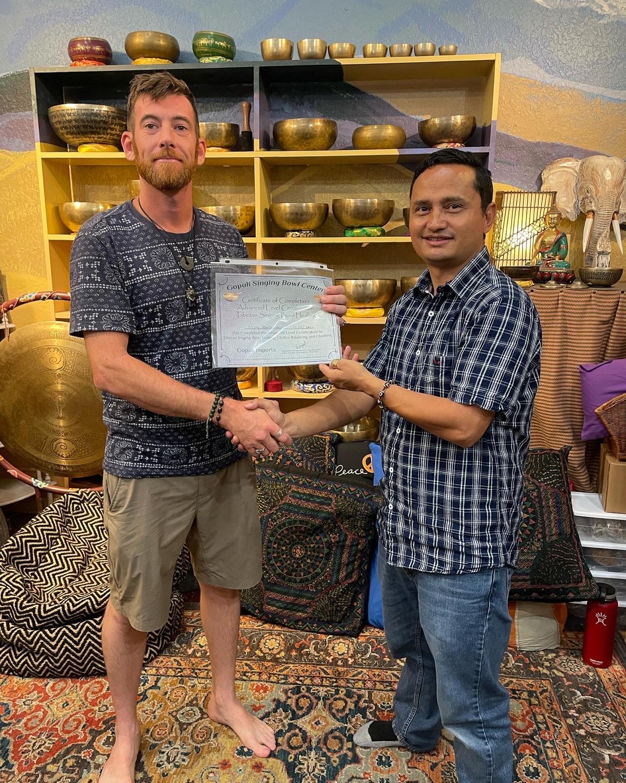 Bryan receiving his advanced Tibetan singing bowl healing certificate