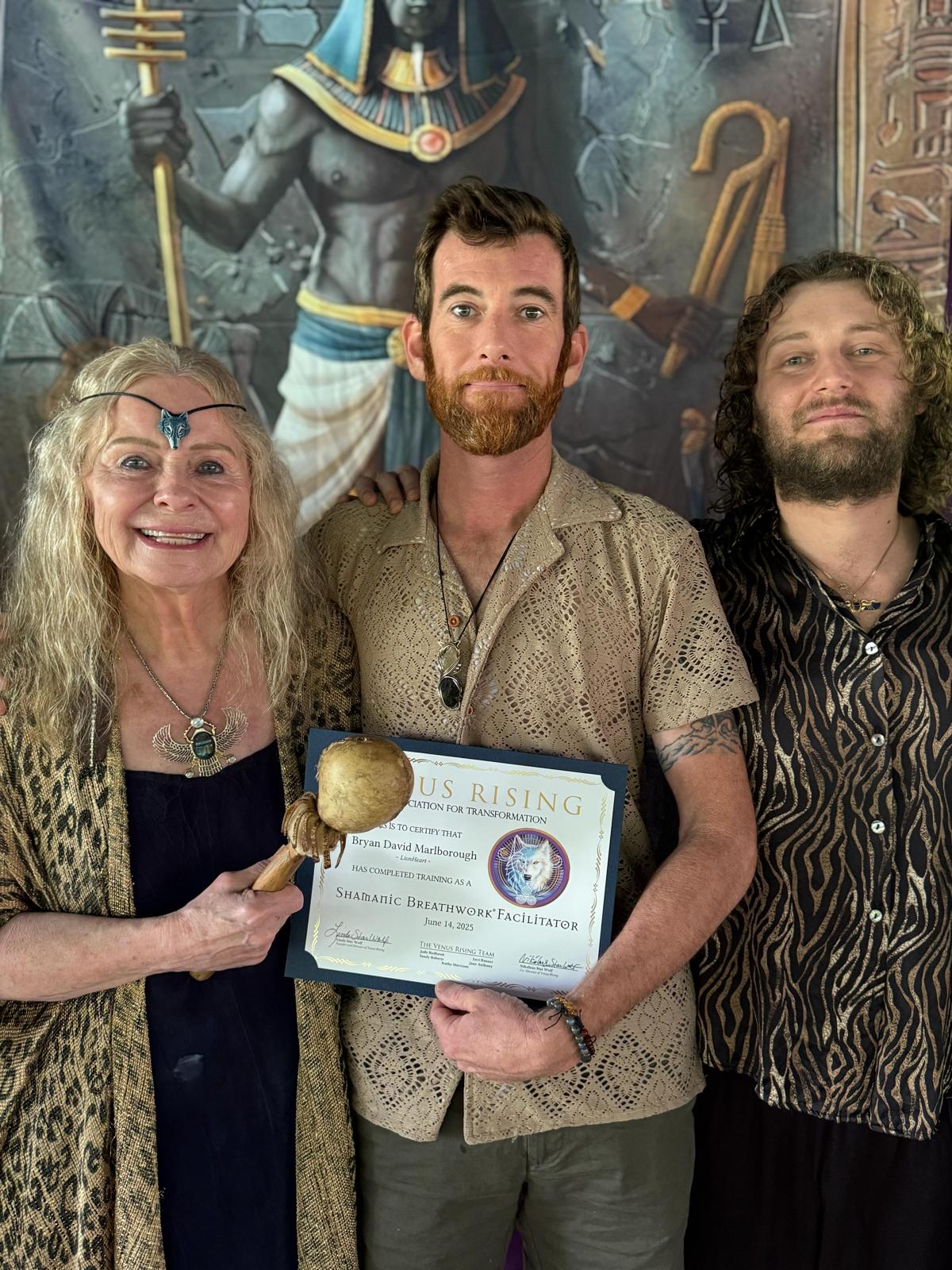 Bryan receiving his Shamanic Breathwork Facilitator certificate from the Venus Rising team